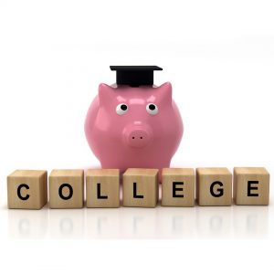 piggy bank on top of blocks that spell college