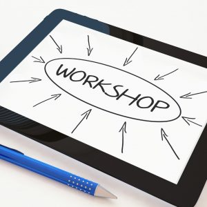 tablet with the word workshop and arrows pointing to it